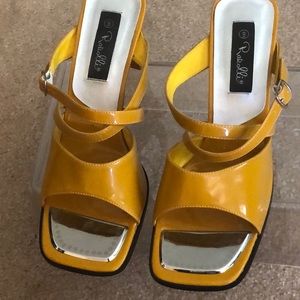 Rarolli mustard yellow open toe block heels.